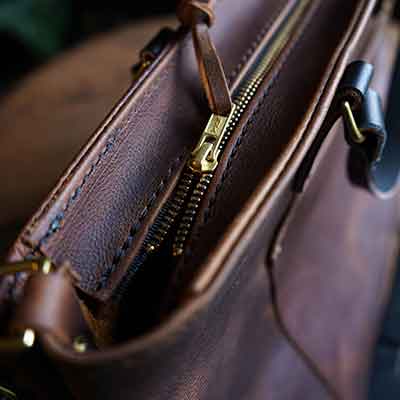 Amber Leather Color Show Close Up On the zipper of a bag